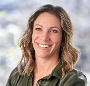 Laurie Poulos. TRANZACT