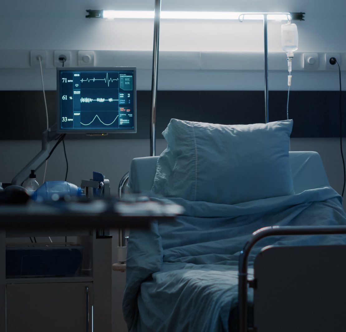 An empty hospital room representing the growing financial pressure on the American healthcare system.