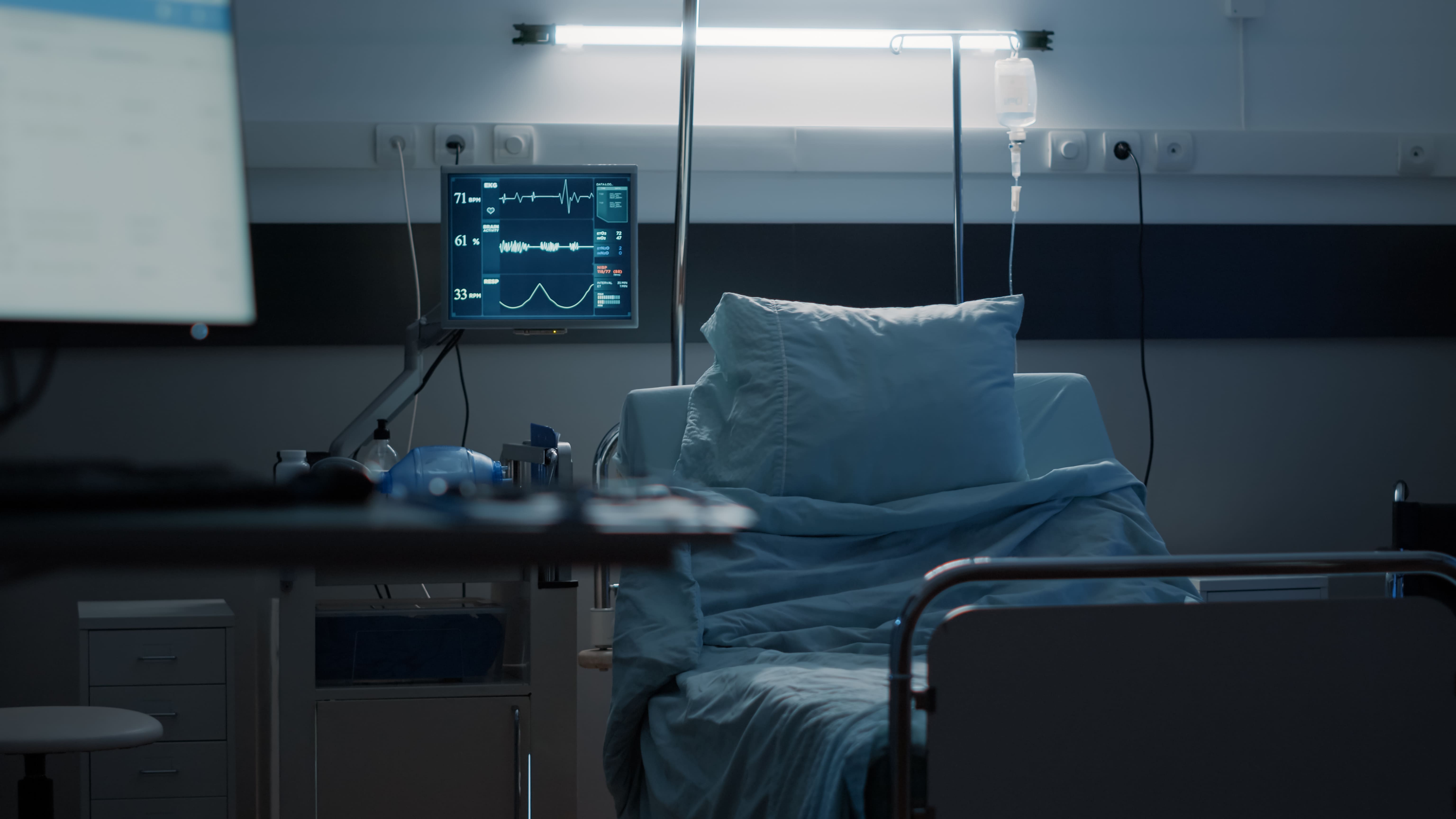 An empty hospital room representing the growing financial pressure on the American healthcare system.