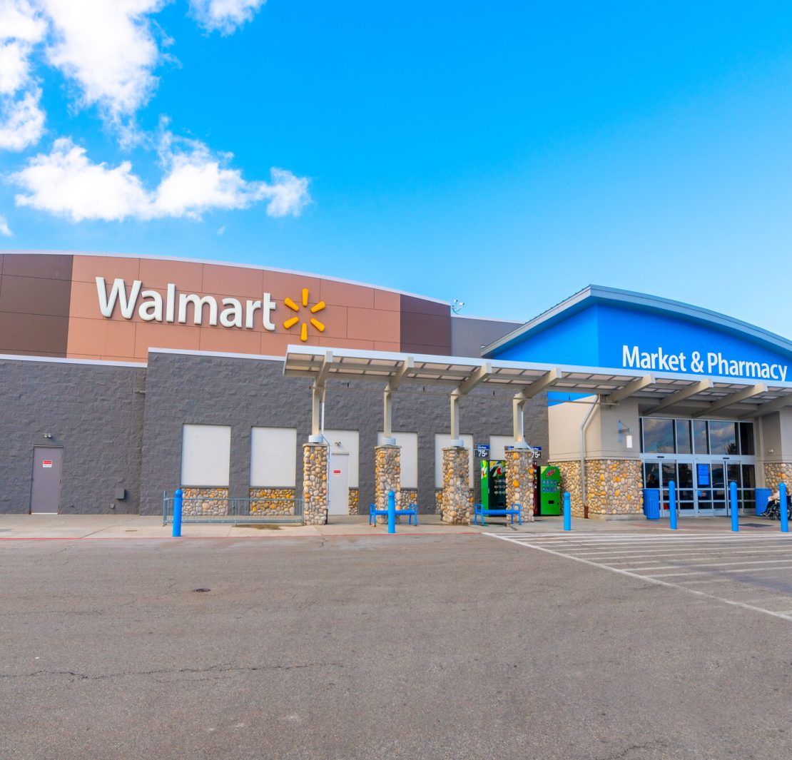 Walmart store exterior illustrating the retailer's expansion of employee healthcare benefits for 2027.