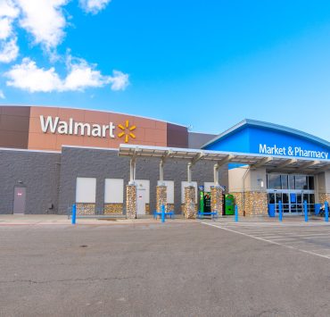 Walmart store exterior illustrating the retailer's expansion of employee healthcare benefits for 2027.