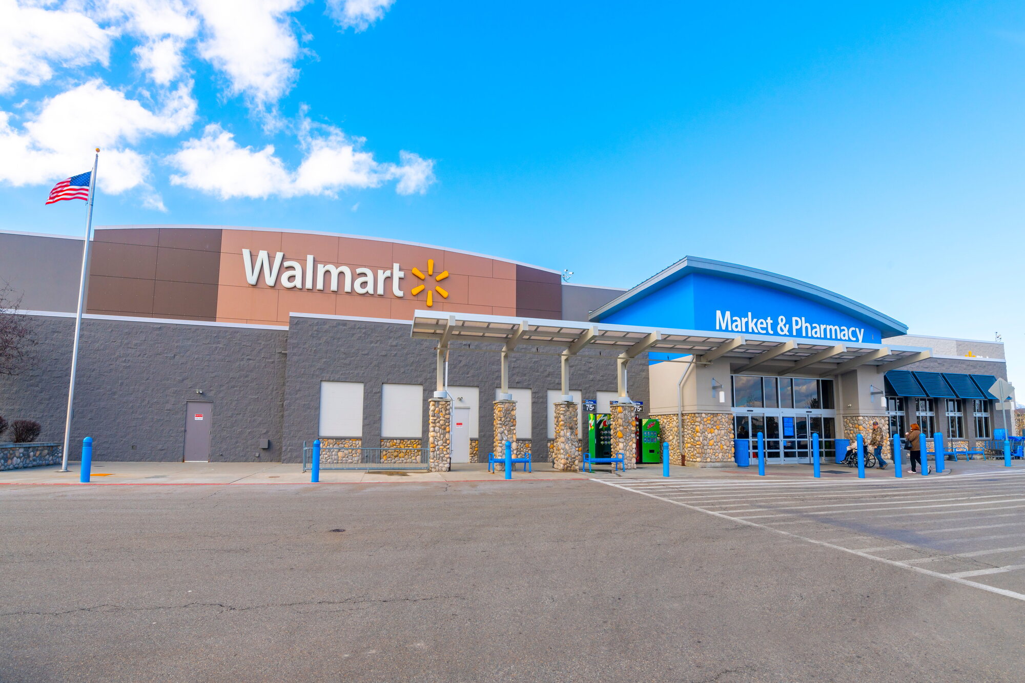 Walmart store exterior illustrating the retailer's expansion of employee healthcare benefits for 2027.